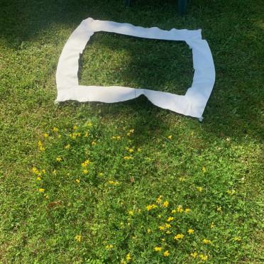 wERDschätzungs-Rahmen auf einer Wiese